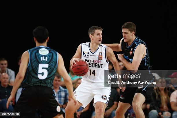 Daniel Kickert of the Bullets competes against Rob Loe of the Breakers during the round nine NBL match between the New Zealand Breakers and the...