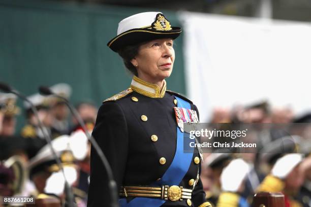 Her Royal Highness The Princess Royal attends the Commissioning Ceremony of HMS Queen Elizabeth at HM Naval Base on December 7, 2017 in Portsmouth,...