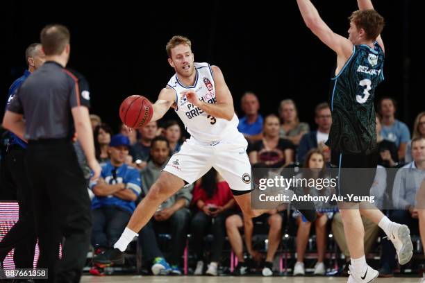 Mitchell Young of the Bullets tries to save the ball in play during the round nine NBL match between the New Zealand Breakers and the Brisbane...