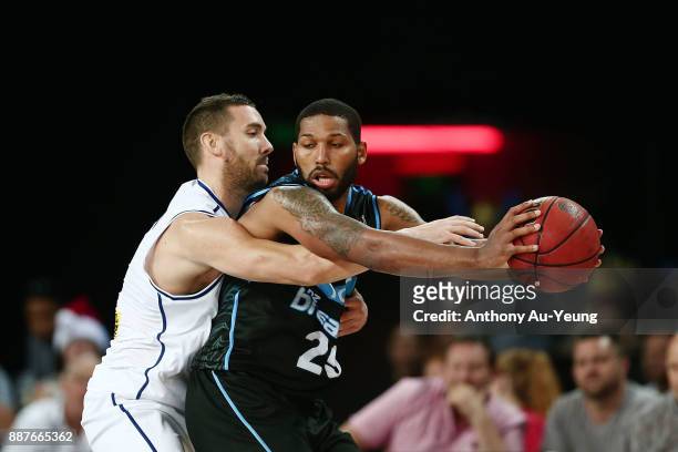 Devonte DJ Newbill of the Breakers is pressured by Adam Gibson of the Bullets during the round nine NBL match between the New Zealand Breakers and...