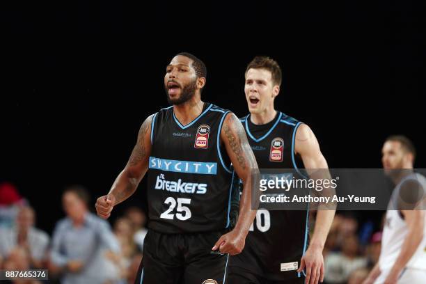 Devonte DJ Newbill and Tom Abercrombie of the Breakers celebrate a basket late in the game during the round nine NBL match between the New Zealand...