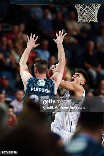 Reuben Te Rangi of the Bullets goes up against Alex Pledger of the Breakers during the round nine NBL match between the New Zealand Breakers and the...