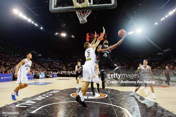 Devonte DJ Newbill of the Breakers goes up against Mitchell Young of the Bullets during the round nine NBL match between the New Zealand Breakers and...