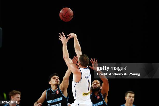 Adam Gibson of the Bullets takes a three pointer during the round nine NBL match between the New Zealand Breakers and the Brisbane Bullets at Spark...