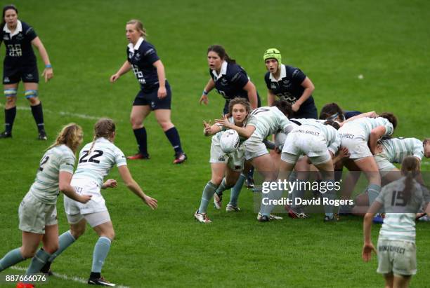 Kate Marks of Cambridge passes the ball during the Oxford University vs Cambridge University Womens Varsity match at Twickenham Stadium on December...