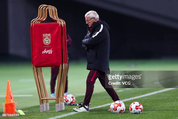 Coach Marcello Lippi of China attends a training session ahead of the 2017 EAFF E-1 Football Championship Final round at Ajinomoto Stadium on...