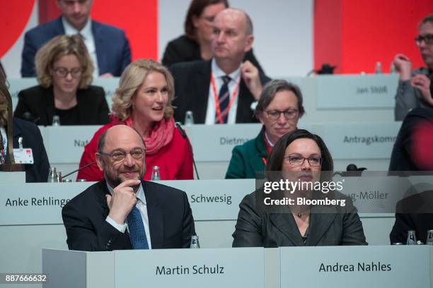 Martin Schulz, leader of the Social Democrat Party , left, sits beside Andrea Nahles, caucus leader of the Social Democrat Party , during the SPD's...