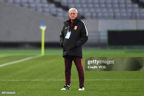Coach Marcello Lippi of China attends a training session ahead of the 2017 EAFF E-1 Football Championship Final round at Ajinomoto Stadium on...