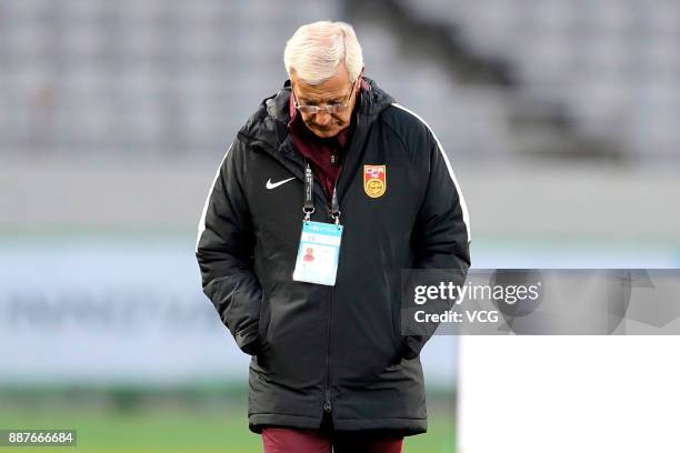 Coach Marcello Lippi of China attends a training session ahead of the 2017 EAFF E-1 Football Championship Final round at Ajinomoto Stadium on...