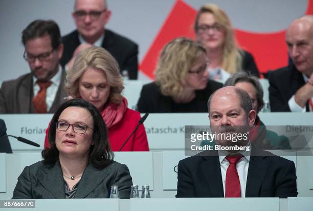 Andrea Nahles, caucus leader of the Social Democrat Party , left, and Olaf Scholz, vice chairman of the Social Democratic Party , look on as Social...