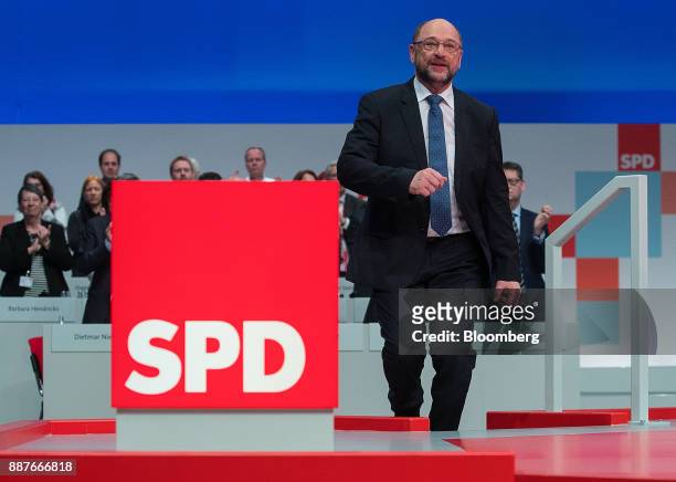 Martin Schulz, leader of the Social Democrat Party , walks on stage to deliver his speech during the SPD's federal party convention in Berlin,...