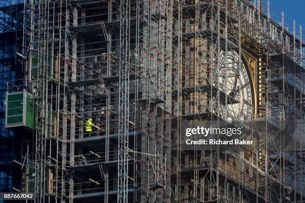 The Elizabeth Tower that holds the now silent Big Ben bell, along with the the Houses of Parliament, are covered in scaffolding, on 1st December...