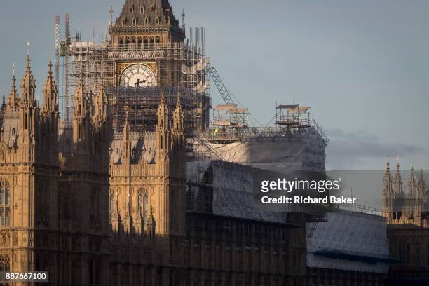 The Elizabeth Tower that holds the now silent Big Ben bell, along with the the Houses of Parliament, are covered in scaffolding, on 1st December...