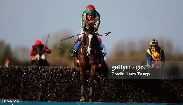 Daklondike ridden by Tom Scudamore on their way to winning the Weatherbys General Stud Book Online Silver Buck Handicap Chase at Wincanton Racecourse...