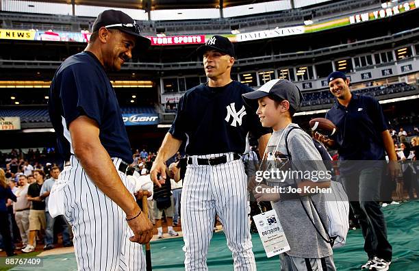 Yankee Player Tony Pe�a, NY Yankees manager Joe Girardi and Ben Grant - 10 year old boy from Starlight Foundation attend NY Yankee batting practice...