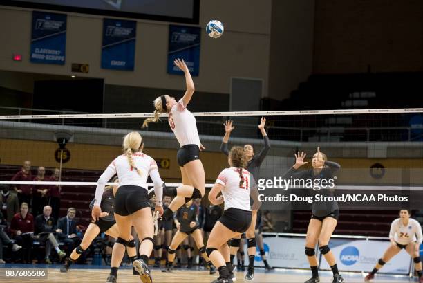 Aubrey Cox of Wittenberg University leaps to tap the ball during the Division III Women's Volleyball Championship held at Van Noord Arena on November...