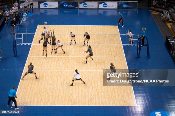 Karen Wildemann of Wittenberg University leaps to spike the ball during the Division III Women's Volleyball Championship held at Van Noord Arena on...