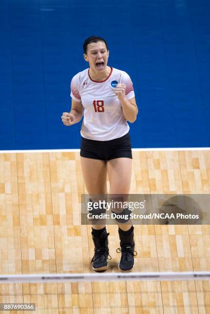 Maddie Fischer of Wittenberg University celebrates after Wittenberg University scores a point during the Division III Women's Volleyball Championship...