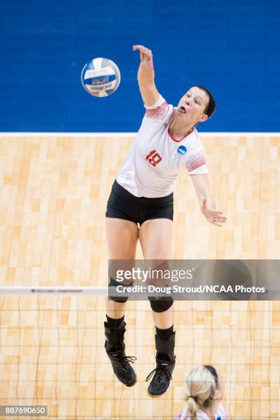 Maddie Fischer of Wittenberg University spikes the ball during the Division III Women's Volleyball Championship held at Van Noord Arena on November...