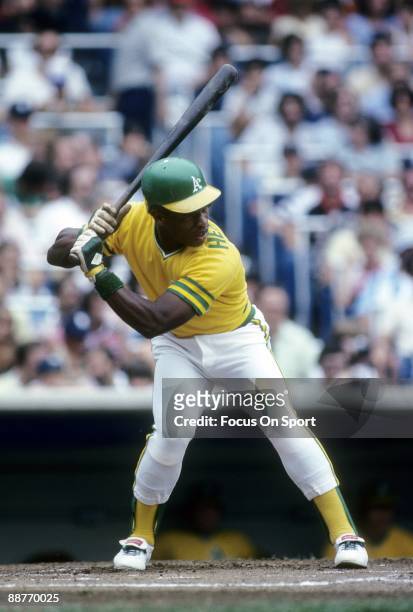 S: Outfielder Rickey Henderson of the Oakland Athletics at the plate ready to hit against the New York Yankees during an early circa 1980's Major...