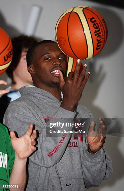 Shelvin Mack of USA spins the ball during the FIBA U19 World Championship captains photocall outside the Maritime Museum on July 1, 2009 in Auckland,...