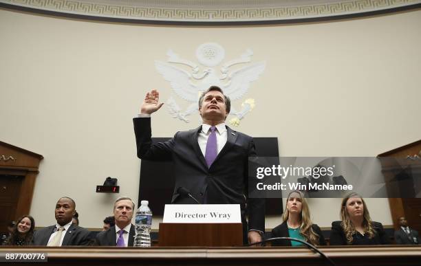 Director Christopher Wray is sworn in prior to testifying before the House Judiciary Committee December 7, 2017 in Washington, DC. The committee...