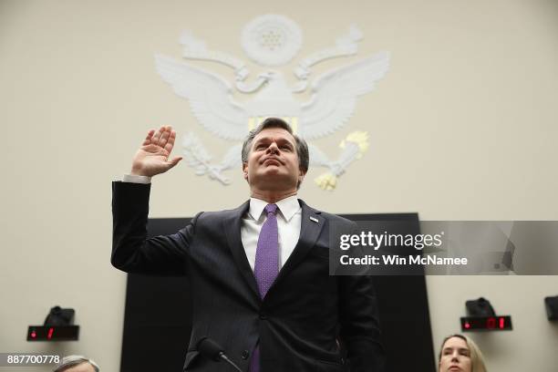 Director Christopher Wray is sworn in prior to testifying before the House Judiciary Committee December 7, 2017 in Washington, DC. The committee...