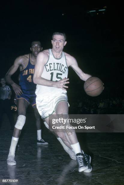 S: Tom Heinsohn of the Boston Celtics in action drives to the basket against the San Francisco Warriors during a mid circa 1960's NBA basketball game...