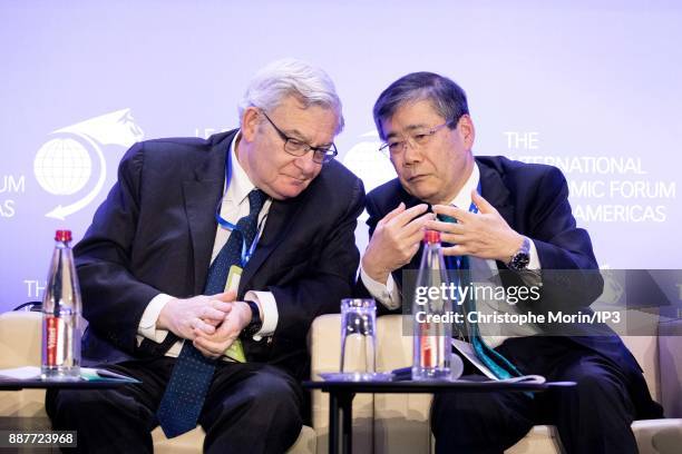 Jean Lemierre Chairman, BNP Paribas Group speaks with Shunichi Miyanaga President and CEO, Mitsubishi Heavy Industries as they attend the first...