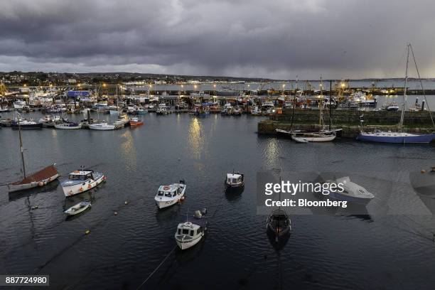 Fishing boats and other vessels lay anchored in Newlyn harbor in Newlyn, U.K., on Saturday, Nov. 25, 2017. Prime Minister Theresa May will pull...