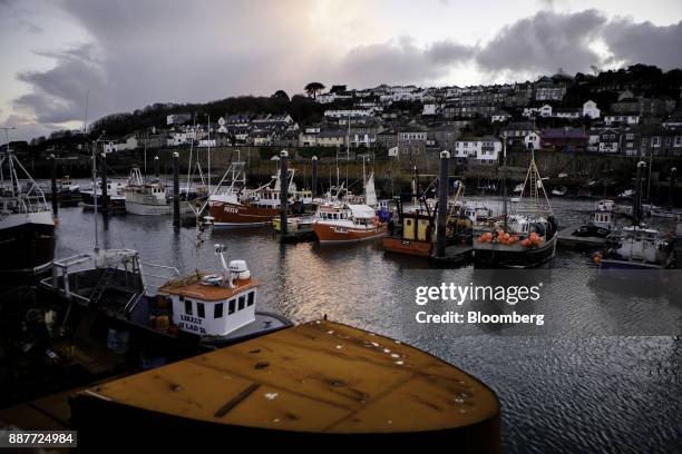 Fishing boats lay at their moorings in Newlyn harbor in Newlyn, U.K., on Saturday, Nov. 25, 2017. Prime Minister Theresa May will pull Britain out of...