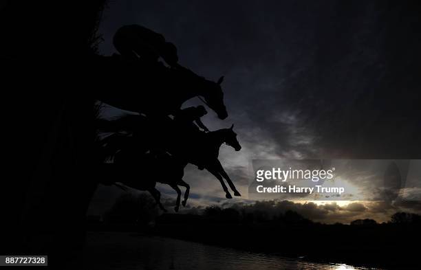 Runners takes the water jump during the Crestmoor Construction Handicap Chase at Wincanton Racecourse on December 7, 2017 in Wincanton, England.