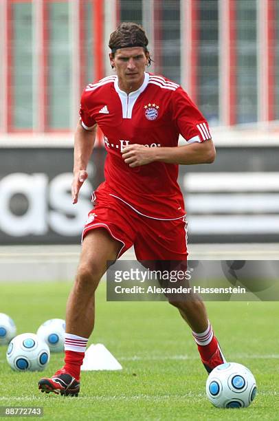 Mario Gomez plays the ball during the FC Bayern Muenchen training session at Bayern's trainings ground Saebener Strasse on July 1, 2009 in Munich,...