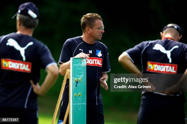 Head coach Ralf Rangnick explains as he stands next to a board during a training session of 1899 Hoffenheim during a training camp on July 1, 2009 in...