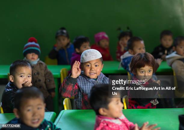 Salar ethnic minority children in a primary school, Qinghai province, Xunhua, China on October 26, 2017 in Xunhua, China.