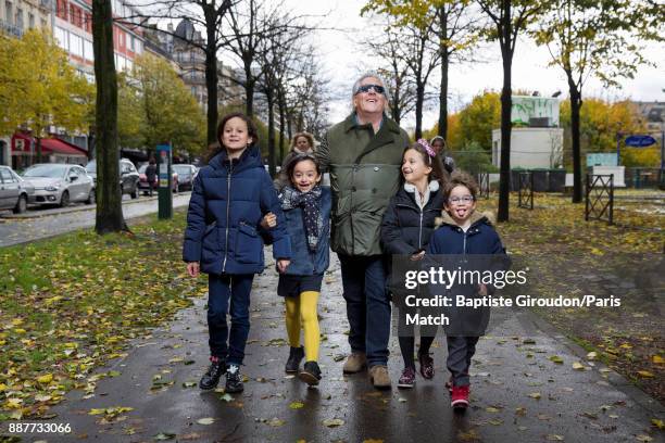 Singer Gilbert Montagne is photographed with his grandchildren for Paris Match on November 12, 2017 in Paris, France.