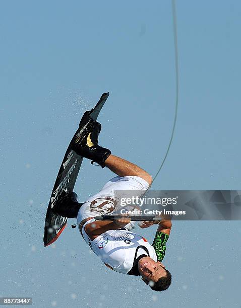 Luciano Molli of Italy competes in the Man's wakeboard heat of the water-skiing finals event during the XVI Mediterranean Games on June 29, 2009 in...