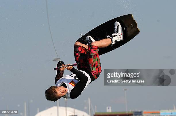 Lucas Langlois of France competes in the Man's wakeboard heat of the water-skiing finals event during the XVI Mediterranean Games on June 29, 2009 in...