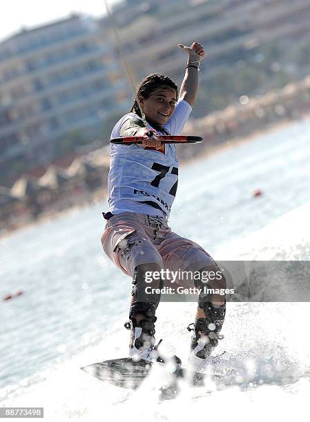 Ginevra Gentile of Italy celebrates competing in the woman's wakeboard heat of the water-skiing finals event during the XVI Mediterranean Games on...