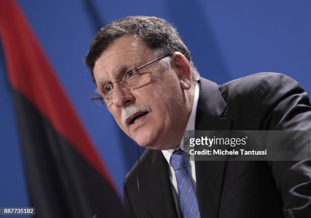 Chairman of the Presidential Council of Libya and prime minister Fayez Mustafa al-Sarraj adress the media during a press conference with Germany...