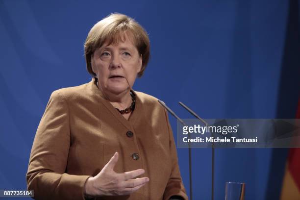 Chancellor Angela Merkel address the media during a press conference with Chairman of the Presidential Council of Libya and prime minister in the...