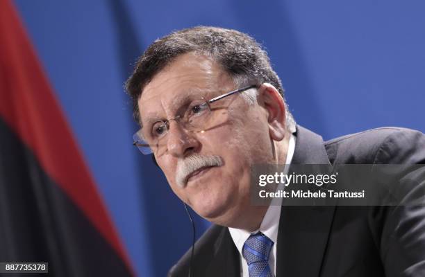 Chairman of the Presidential Council of Libya and prime minister Fayez Mustafa al-Sarraj adress the media during a press conference with Germany...