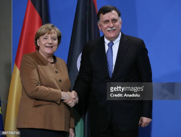 German Chancellor Angela Merkel and Chairman of the Presidential Council of Libya and Prime Minister of the Government of National Accord of Libya...
