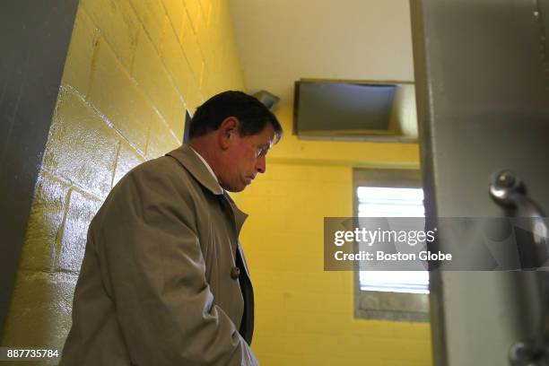 Presiding Plymouth Superior Court Judge Jeffrey Locke looks into Cell 13 at the Bridgewater State Hospital in Bridgewater, MA on Dec. 6 as a visit to...