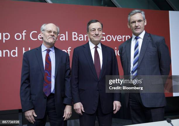 Stefan Ingves, governor of the Sveriges Riksbank and chairman of the Basel Committee, left, Mario Draghi, president of the European Central Bank ,...