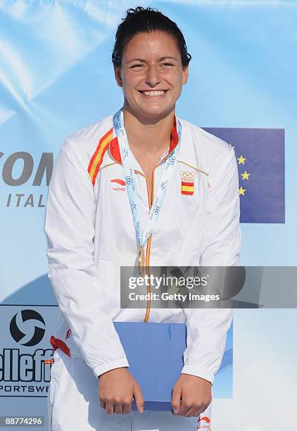 Gold medalist Patricia Castro Ortega of Spain stands on the podium during the medal ceremony for the women's 200m freestyle final at the XVI...