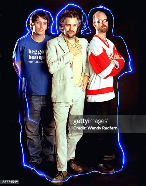 Steven Drozd, Wayne Coyne and Michael Ivins of The Flaming Lips pose for a group portrait on April 30, 2003 in Los Angeles, California.