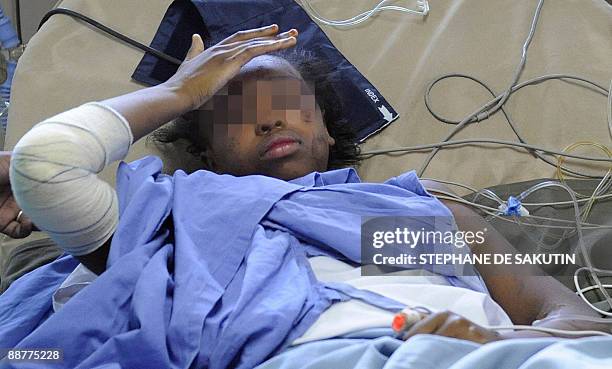 Bahia Bakari lies in her bed at the Moroni hospital on July 1, 2009 after she miraculously survived the Yemenia airliner crash off the Comoros...