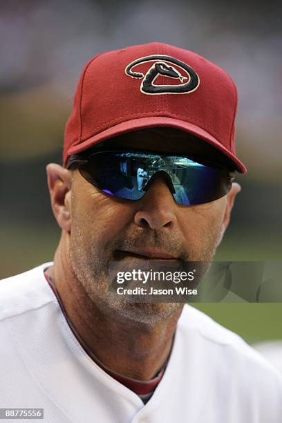 Kirk Gibson of the Arizona Diamondbacks looks from the dugout against the Chicago Cubs on Wednesday, April 29, 2009 at Chase Field in Phoenix,...