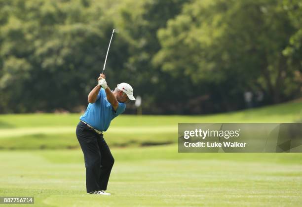 Hennie Otto of South Africa plays a shot on the 17th hole during the first day of the Joburg Open at Randpark Golf Club on December 7, 2017 in...